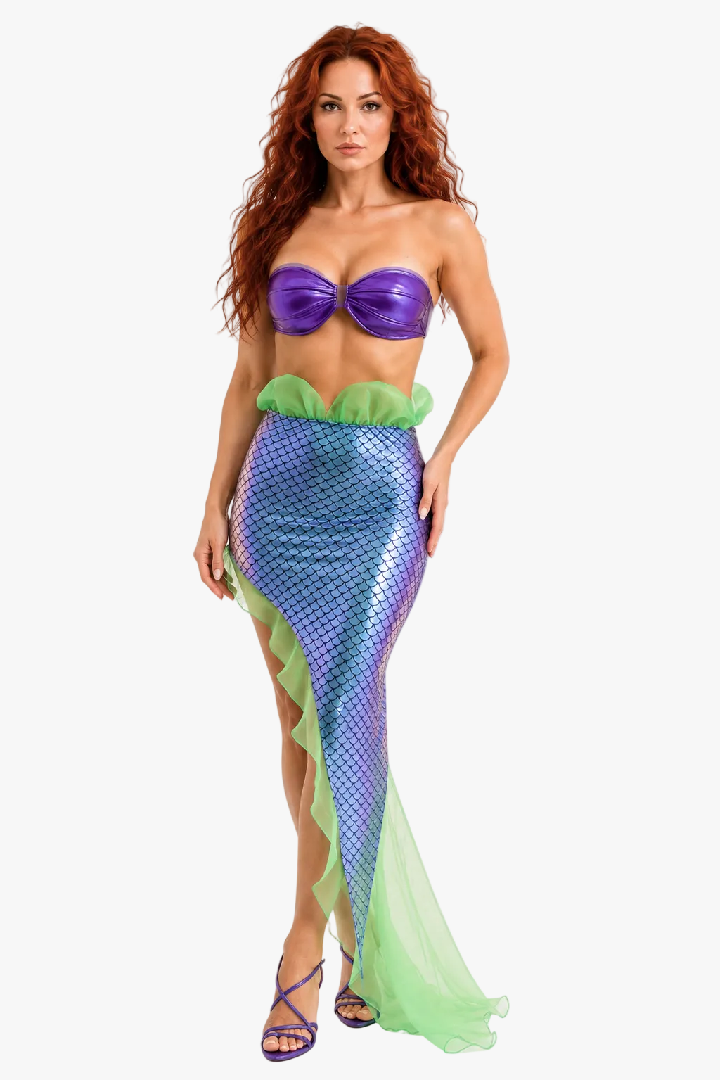 A woman modeling a mermaid ariel costume consisting of a purple strapless top and a shimmering blue-purple scale-patterned tail with green ruffled trim, against a plain light gray background.