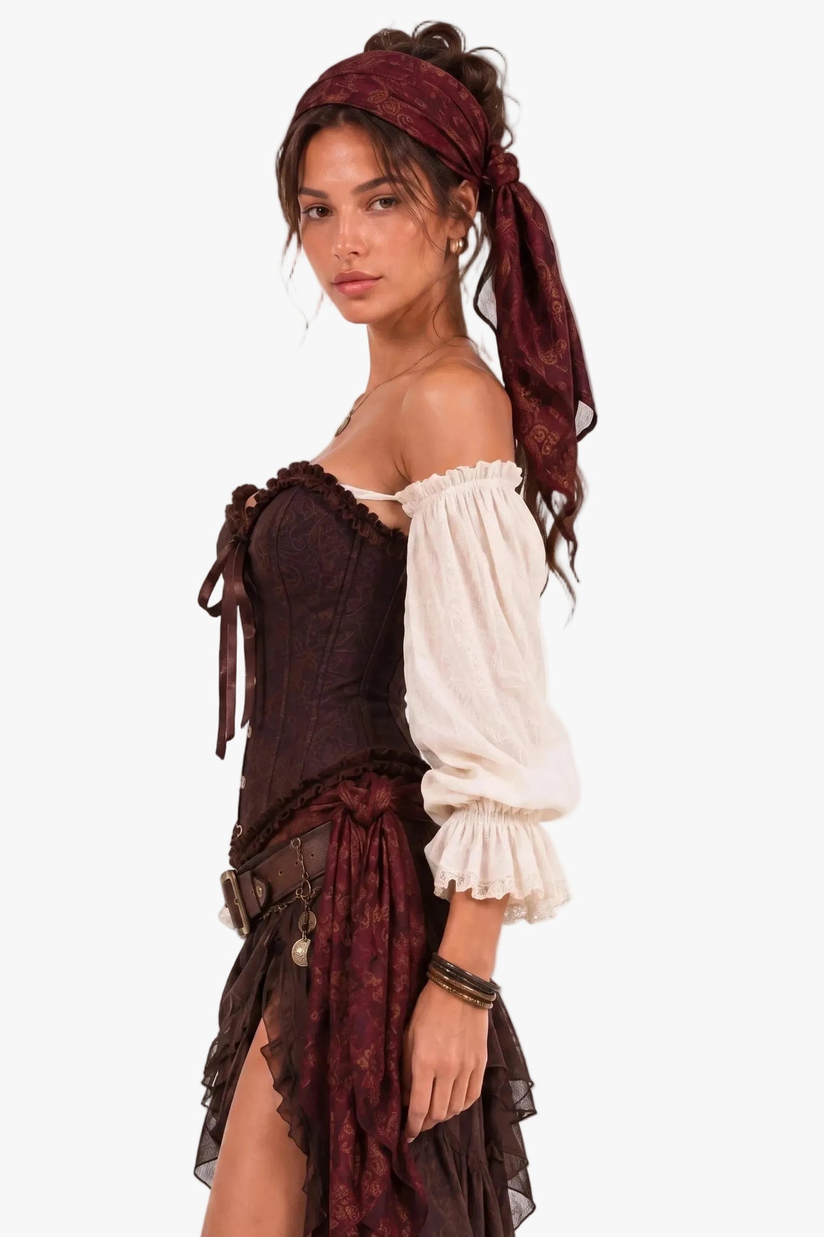 A woman modeling a pirate-style costume dress with a dark brown corset top, off-the-shoulder cream puff sleeves, a dark red patterned skirt, and a matching headscarf, set against a plain white background.
