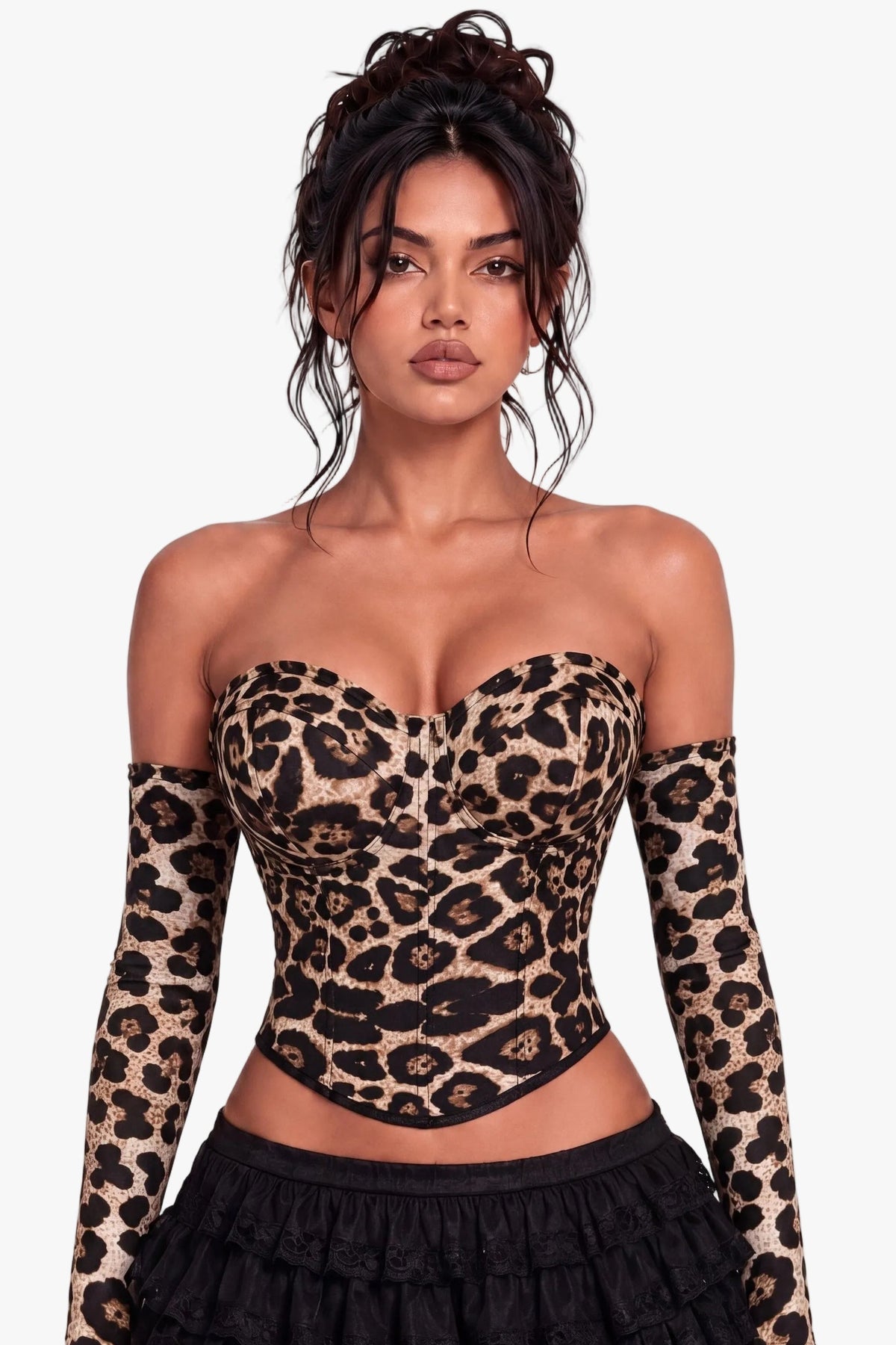 A model wearing a strapless leopard-print corset top with long sheer sleeves and a black ruffled mini skirt, photographed against a plain white studio background.