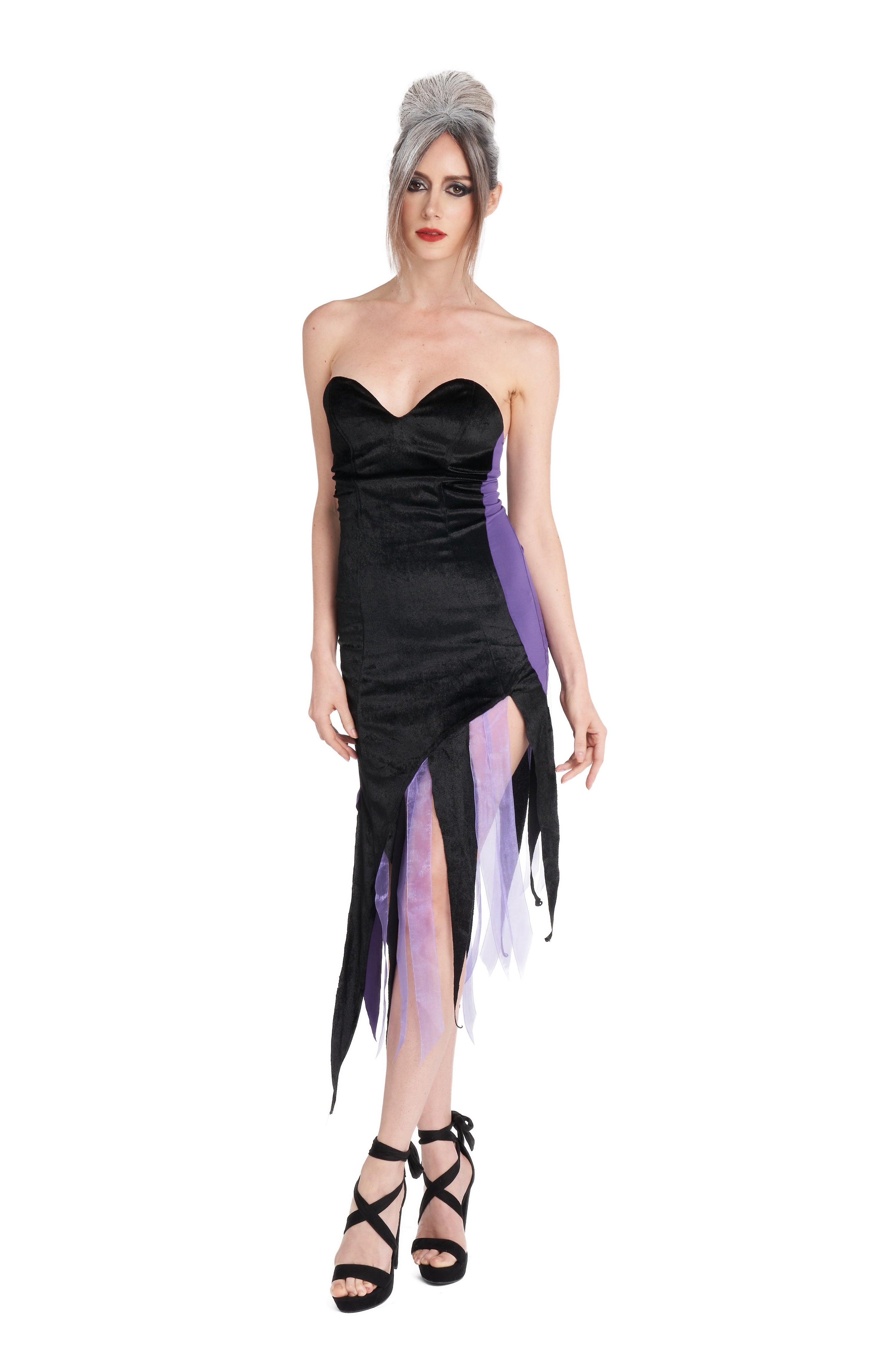 Model in deep-sea octopus villain costume with tentacle-inspired skirt and shell details