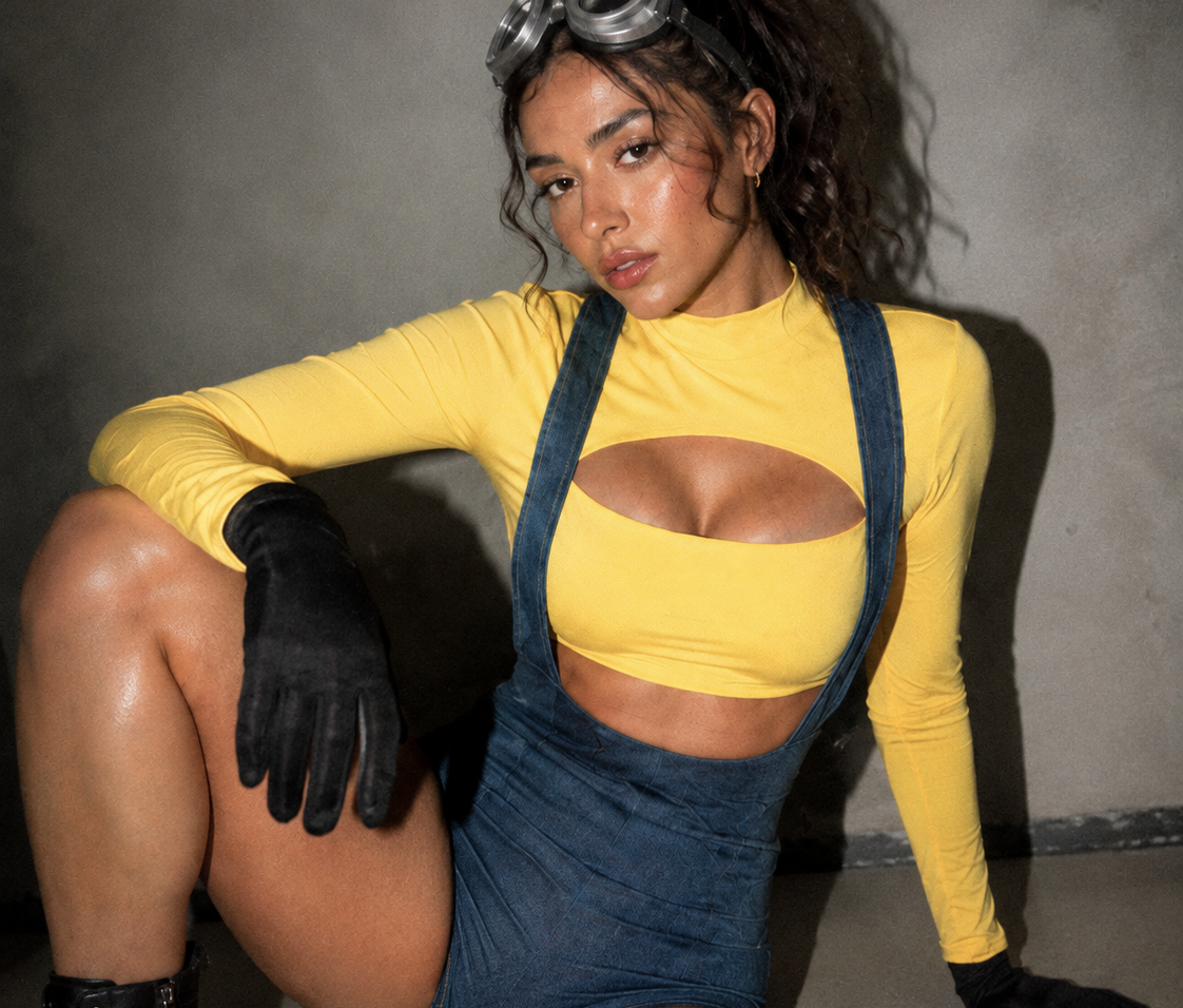 a model modeling a minion inspired costume