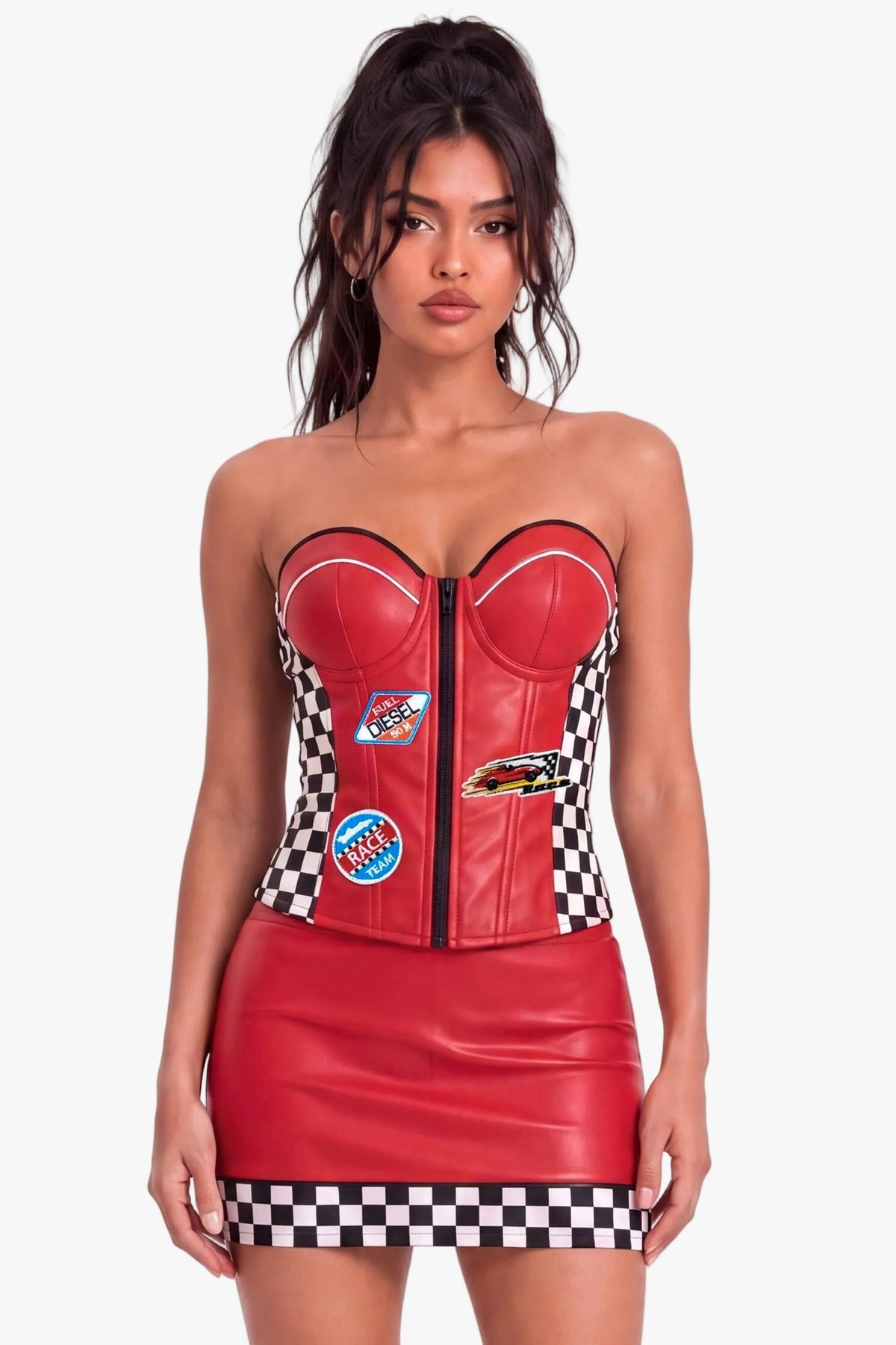 A model wearing a red faux leather racing-themed sweetheart corset-style top, black and white checkered side panels, and racing patch details, set against a plain white studio background.